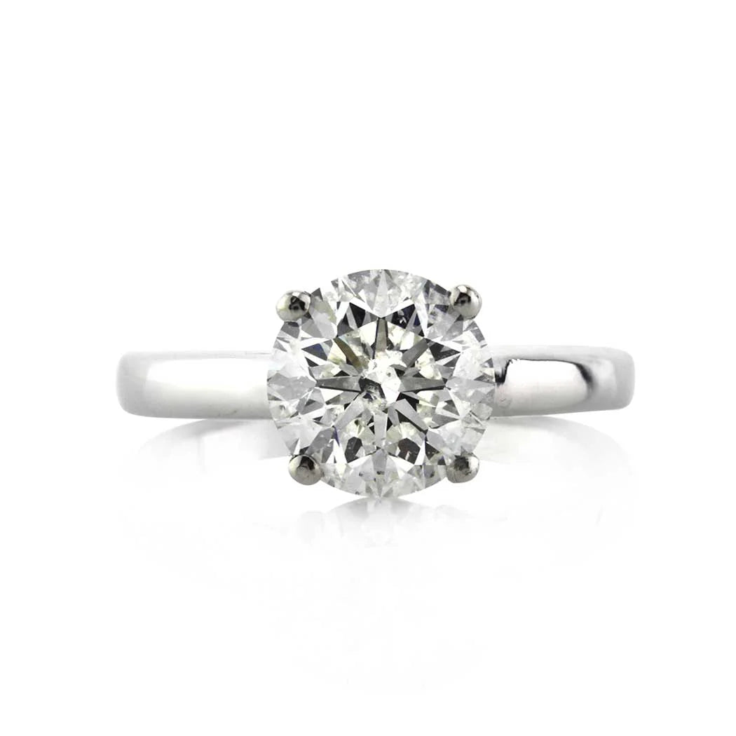 Solitaire Engagement Ring Embellished With a Four Prong Signature Head