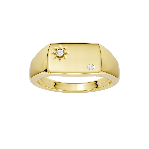 A top-down view of a 14K yellow gold signet ring with a sunburst motif and a brilliant round jewel.