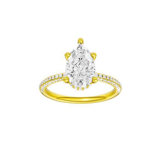 Pear-cut diamond engagement ring with a pavé-set diamond band and hidden-halo setting.