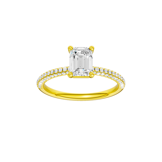 Emerald-cut diamond engagement ring with a pavé-set diamond band and solitaire setting.