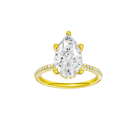 Pear-cut diamond engagement ring with a pavé-set diamond band and hidden-halo setting.