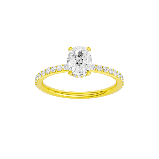 Elongated cushion-cut diamond engagement ring with a prong-set diamond band and hidden-halo setting.
