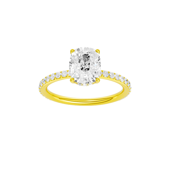 Elongated cushion-cut diamond engagement ring with a prong-set diamond band and hidden-halo setting.