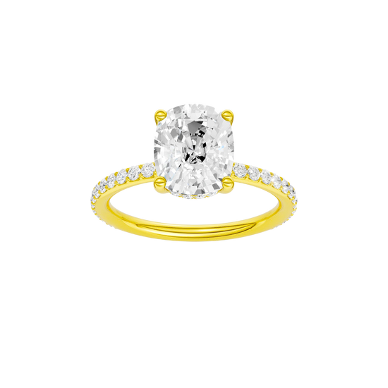 Elongated cushion-cut diamond engagement ring with a prong-set diamond band and hidden-halo setting.
