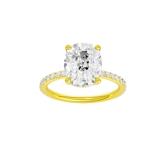 Elongated cushion-cut diamond engagement ring with a prong-set diamond band and hidden-halo setting.