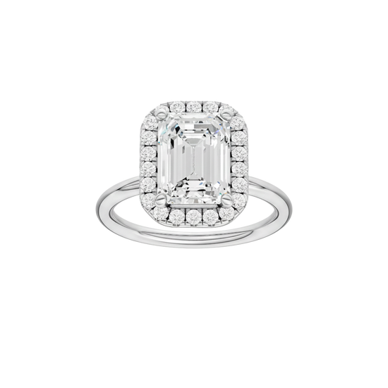 Emerald-cut diamond engagement ring with a plain band and halo setting.