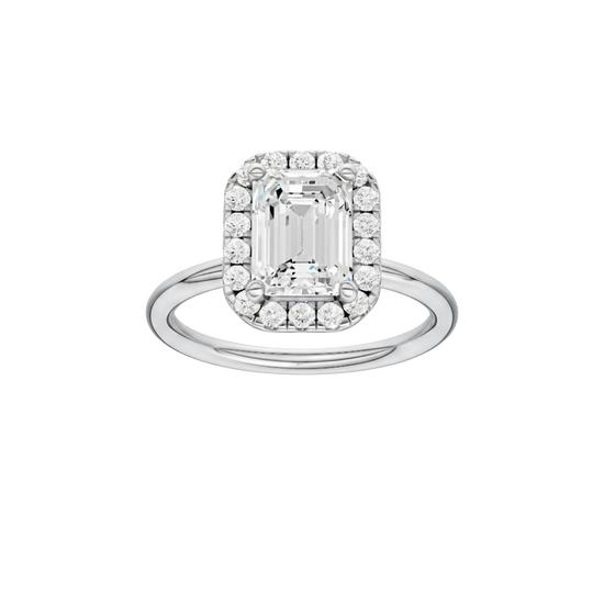 Emerald-cut diamond engagement ring with a plain band and halo setting.