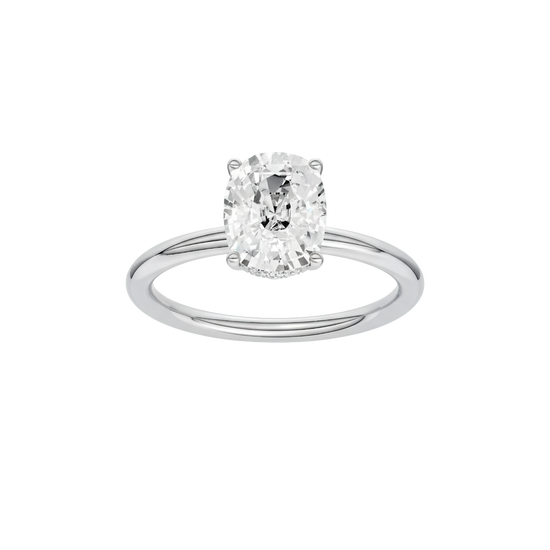 Elongated cushion-cut diamond engagement ring in 14k white gold with a plain band and hidden-halo setting