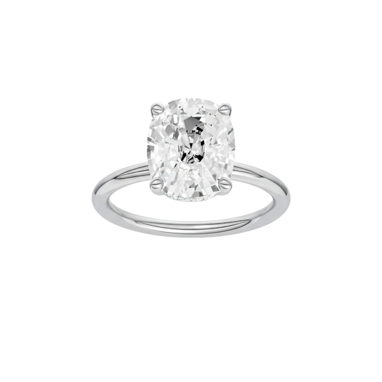 Elongated cushion-cut diamond engagement ring in 14k white gold with a plain band and hidden-halo setting