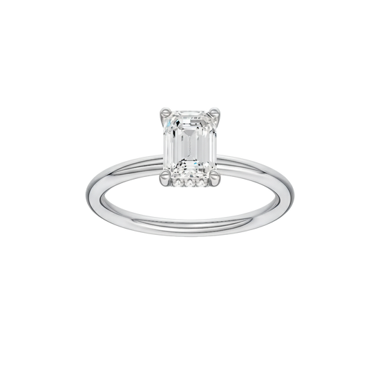 Emerald-cut diamond engagement ring with a plain band and hidden-halo setting.