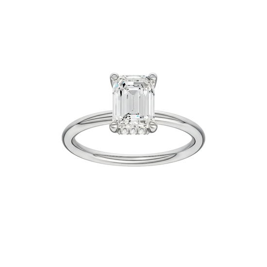 Emerald-cut diamond engagement ring with a plain band and hidden-halo setting.