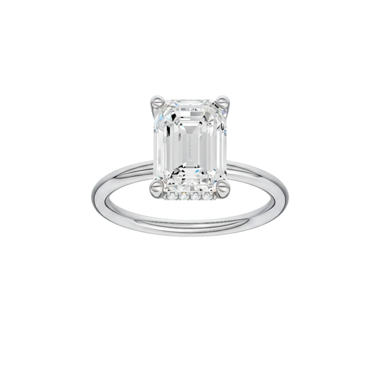 Emerald-cut diamond engagement ring with a plain band and hidden-halo setting.