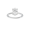 Oval-cut diamond engagement ring with a plain band and hidden-halo setting.