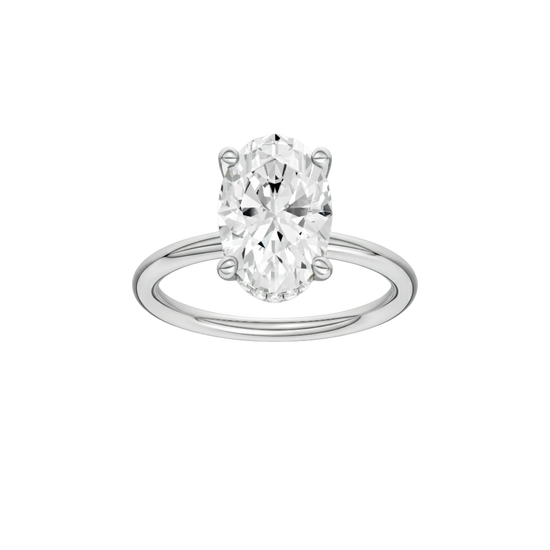 Oval-cut diamond engagement ring with a plain band and hidden-halo setting.