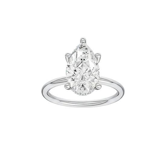 Pear-cut diamond engagement ring with a plain band and hidden-halo setting.