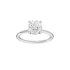 Round-cut diamond engagement ring with a plain band and hidden-halo setting.