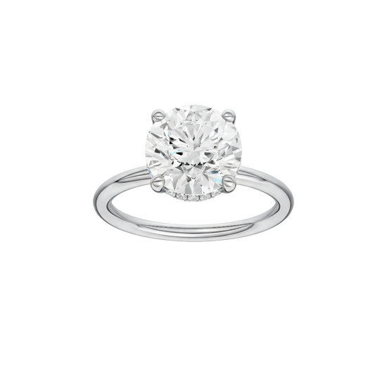 Round-cut diamond engagement ring with a plain band and hidden-halo setting.