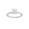 Round-cut diamond engagement ring with a plain band and hidden-halo setting.