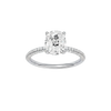 Elongated cushion-cut diamond engagement ring with a pavé-set diamond band and solitaire setting.