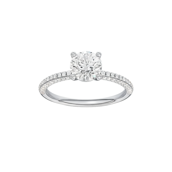 Round-cut diamond engagement ring with a pavé-set diamond band and solitaire setting.