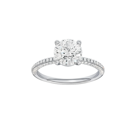 Round-cut diamond engagement ring with a pavé-set diamond band and solitaire setting.