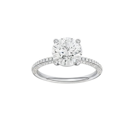 Round-cut diamond engagement ring with a pavé-set diamond band and solitaire setting.