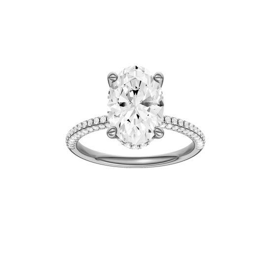 Oval-cut diamond engagement ring with a pavé-set diamond band and hidden-halo setting.