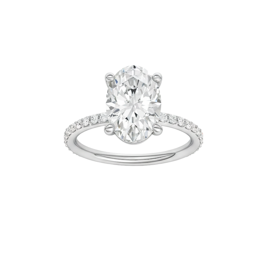Oval-cut diamond engagement ring with a prong-set diamond band and solitaire setting.