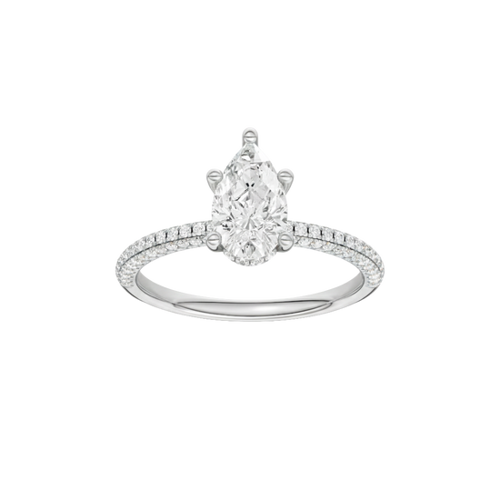 Pear-cut diamond engagement ring with a pavé-set diamond band and hidden-halo setting.