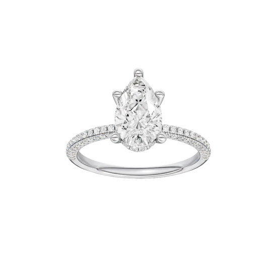 Pear-cut diamond engagement ring with a pavé-set diamond band and hidden-halo setting.