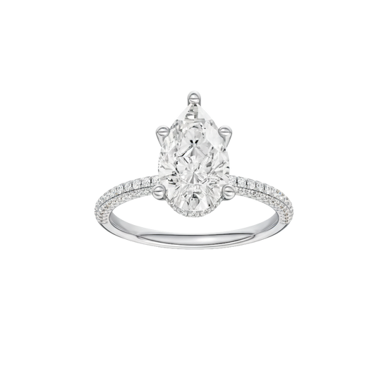 Pear-cut diamond engagement ring with a pavé-set diamond band and hidden-halo setting.