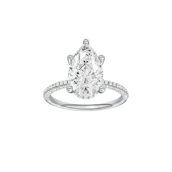 Pear-cut diamond engagement ring with a pavé-set diamond band and hidden-halo setting.