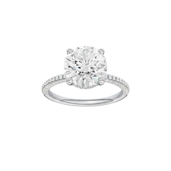 Round-cut diamond engagement ring with a pavé-set diamond band and hidden-halo setting.