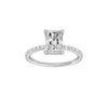 Radiant-cut diamond engagement ring with a prong-set diamond band and hidden-halo setting.