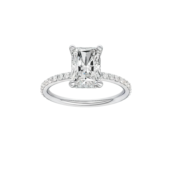 Radiant-cut diamond engagement ring with a prong-set diamond band and hidden-halo setting.