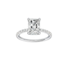 Radiant-cut diamond engagement ring with a prong-set diamond band and hidden-halo setting.