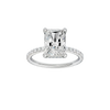 Radiant-cut diamond engagement ring with a prong-set diamond band and hidden-halo setting.