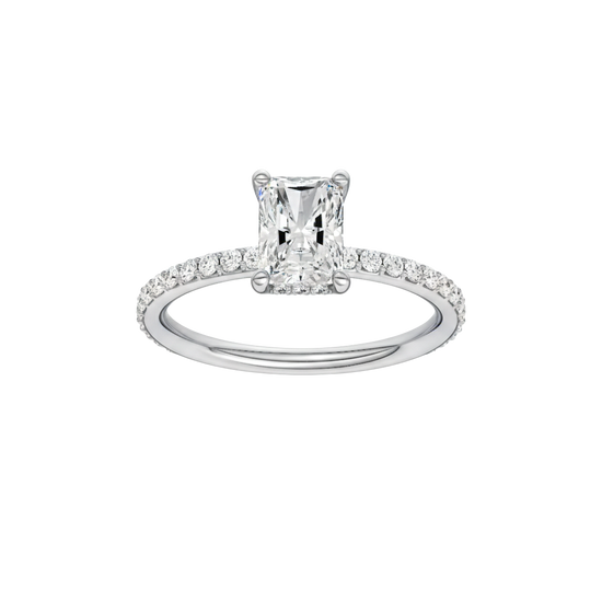 Radiant-cut diamond engagement ring with a prong-set diamond band and hidden-halo setting.