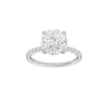 Round-cut diamond engagement ring with a prong-set diamond band and solitaire setting.