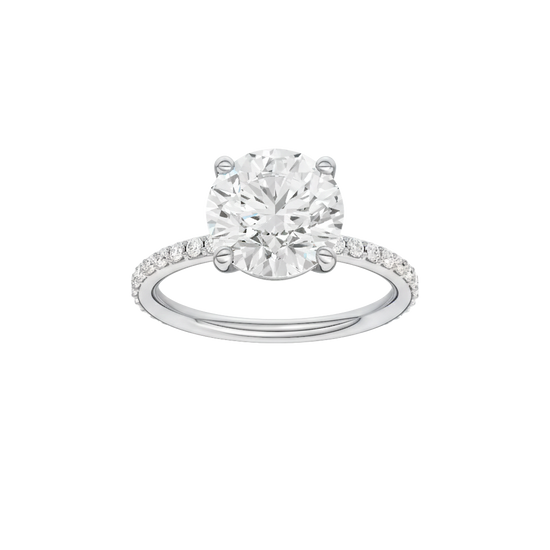 Round-cut diamond engagement ring with a prong-set diamond band and solitaire setting.