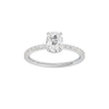 Elongated cushion-cut diamond engagement ring with a prong-set diamond band and hidden-halo setting.