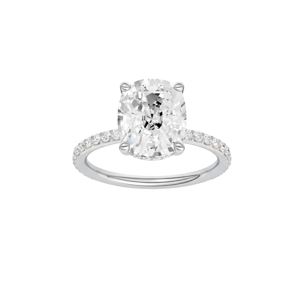 Elongated cushion-cut diamond engagement ring with a prong-set diamond band and hidden-halo setting.