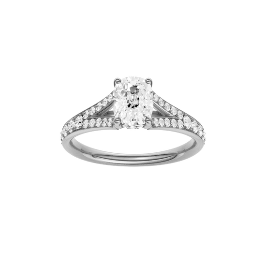 Elongated cushion-cut diamond engagement ring with a channel-set diamond band and hidden-halo setting.