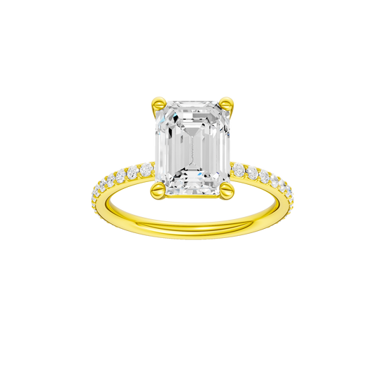 Emerald-cut diamond engagement ring with a prong-set diamond band and solitaire setting.