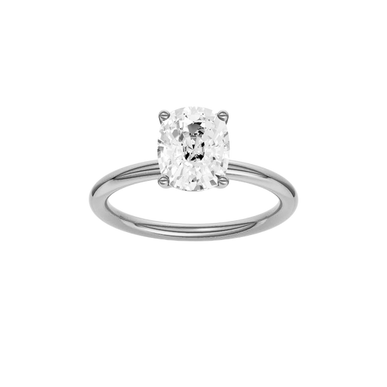 Elongated cushion-cut diamond solitaire engagement ring in 14k white gold with a plain band
