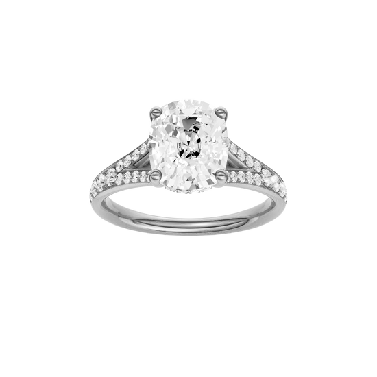 Elongated cushion-cut diamond engagement ring with a channel-set diamond band and hidden-halo setting.