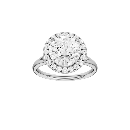 Round-cut diamond engagement ring with a plain band and halo setting.