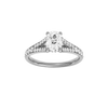 Elongated cushion-cut diamond engagement ring with a channel-set diamond band and hidden-halo setting.