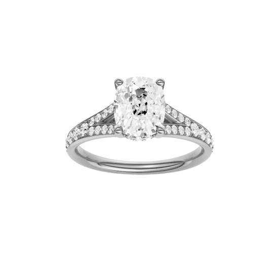 Elongated cushion-cut diamond engagement ring with a channel-set diamond band and hidden-halo setting.