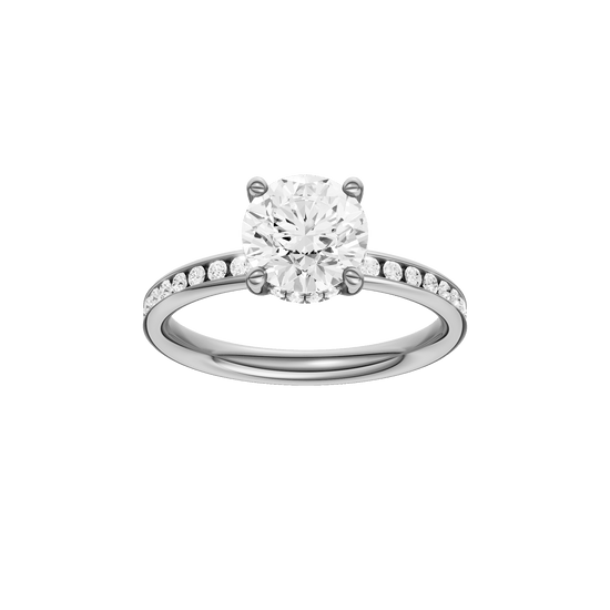 Round-cut diamond engagement ring with a channel-set diamond band and hidden-halo setting.